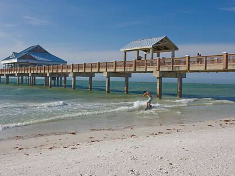 Clearwater Beach and its fishing pier on the Gulf of Mexico in Pinellas County
